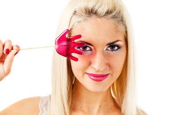 Beautiful blonde with a lollipop - Fotografie, Obrázek
