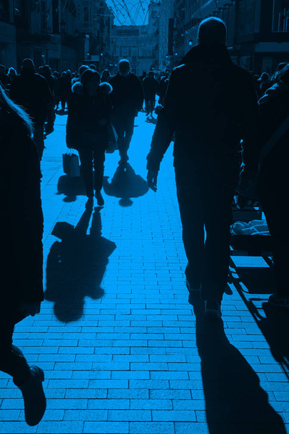 People on the street. Urban crowd in blue tone - Photo, Image