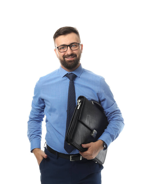 Confident businessman with bag on white background - Fotoğraf, Görsel