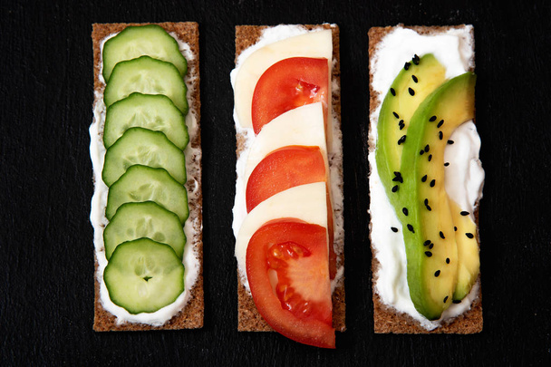 Healthy different rye sandwiches from whole grain rye crispbread. The concept of healthy eating - 写真・画像