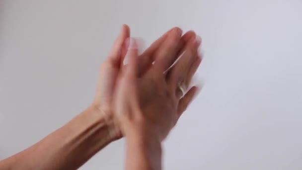 Woman's hands applauded on a white background - Video, Çekim