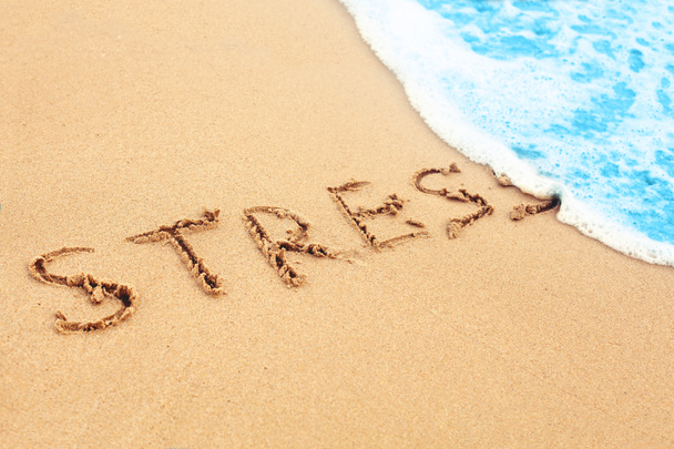 Stress free travel. The wave on sea beach washes away sign stress - Photo, Image
