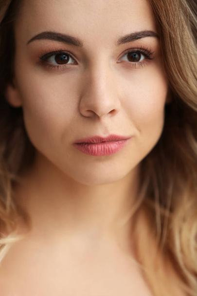 Portrait of beautiful young woman, closeup - Fotografie, Obrázek