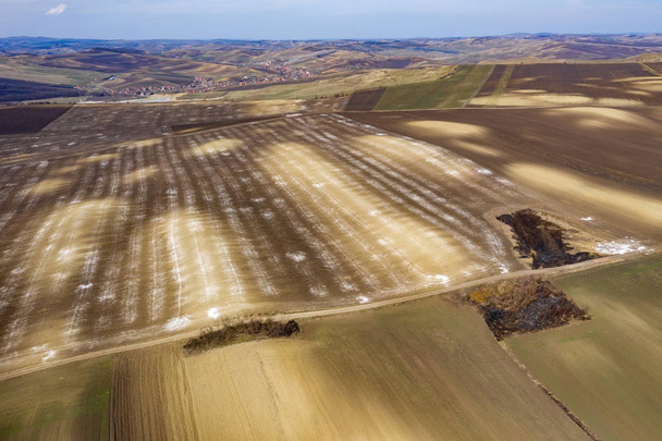 Aerial view of white chemical fertilizer, manure on the ground - Photo, image