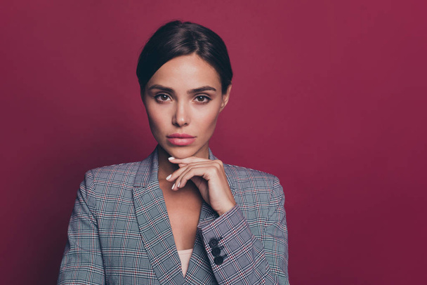 Close up photo beautiful amazing business she her lady arm hand chin gentle tender self-confident seriously looking wearing formal-wear checkered plaid suit isolated dark red vivid background - Foto, afbeelding