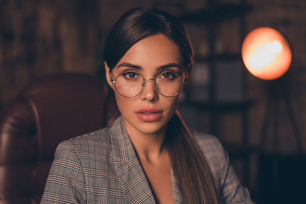Close up photo beautiful stunning she her business lady chief work day night look attentively interview candidate interested sit big large office chair wear specs formal wear checkered plaid suit - Photo, image