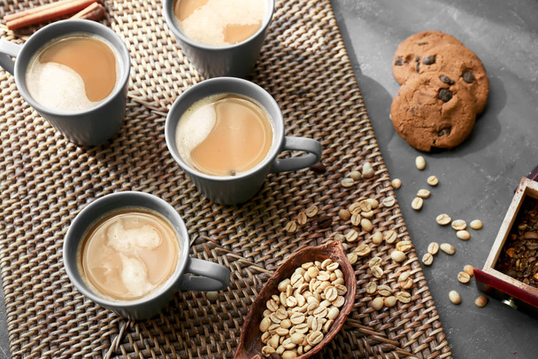 Cups with tasty aromatic coffee and cookies on table - Photo, Image