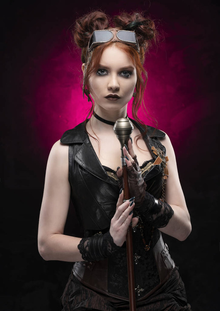 A beautiful red-haired cosplayer girl wearing a Victorian-style  - Fotoğraf, Görsel