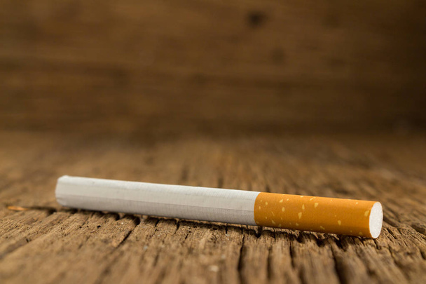Tobacco cigarette on a  wooden - Valokuva, kuva