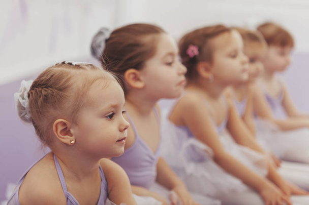 Lovely little ballerinas at the dance studio - Foto, afbeelding