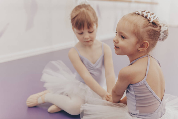 Lovely little ballerinas at the dance studio - Фото, зображення