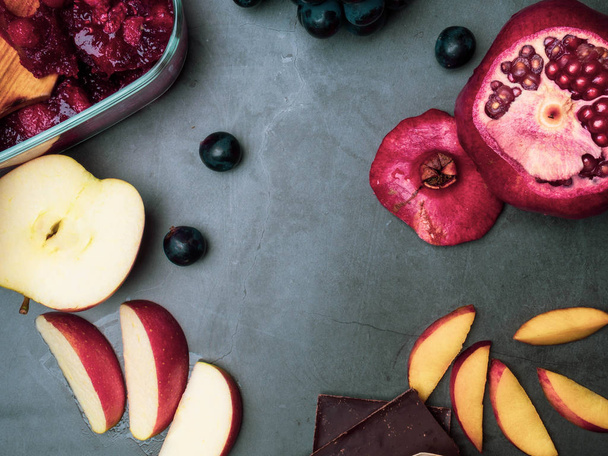 flavonoid, antioxidants, resveratrol rich food on grey concrete - Photo, Image