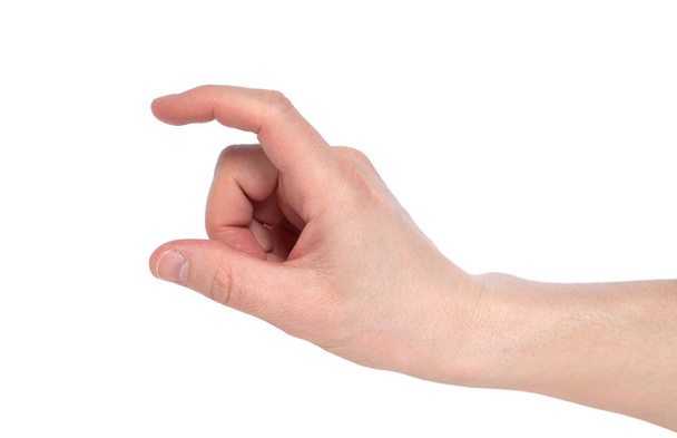 Male caucasian hand gesturing a small amount, or smal size, isol - Photo, Image