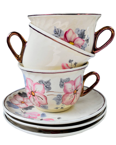 Ylellinen posliini vintage teekupit kaunis kukka muotoilu ylhäältä ja sivulta. Valkoisella pohjalla eristetyt rakenneosat
. - Valokuva, kuva