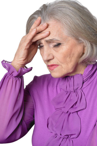 szomorú idősebb nő - Fotó, kép