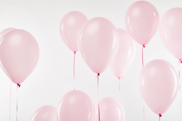 background with pink festive balloons isolated on white - Foto, imagen