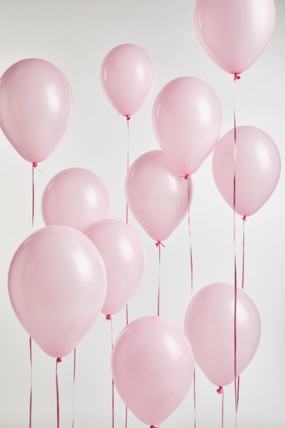 background with decorative pink air balloons isolated on white - Φωτογραφία, εικόνα