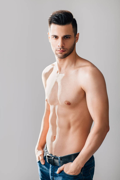 Sexy muscular shirtless man posing in studio. Male beauty - Zdjęcie, obraz