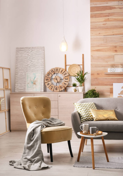 Stylish living room interior with comfortable sofa. Idea for home decor - Foto, imagen