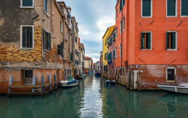 View of the street canal in Venice, Italy. Colorful facades of o - Foto, immagini
