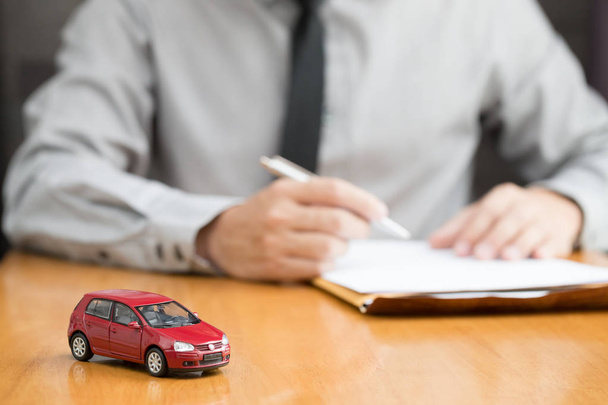Car rental inspector filling contract, Rent a car concept - Фото, изображение