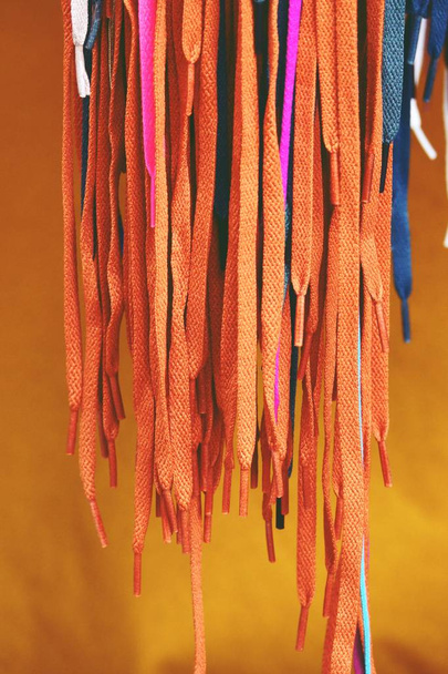 many colorful shoelaces at the street shop - Photo, Image