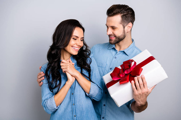 Close up photo amazing she her he him his lady guy romance surprise hold big large giftbox appreciate attention sweetheart wear casual jeans denim shirts outfit clothes isolated grey background - Fotografie, Obrázek