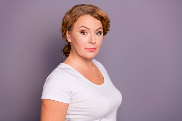 Portrait of her she nice charming well-groomed attractive candid glamorous wavy-haired lady wearing casual white shirt isolated over gray violet purple pastel background - Photo, image