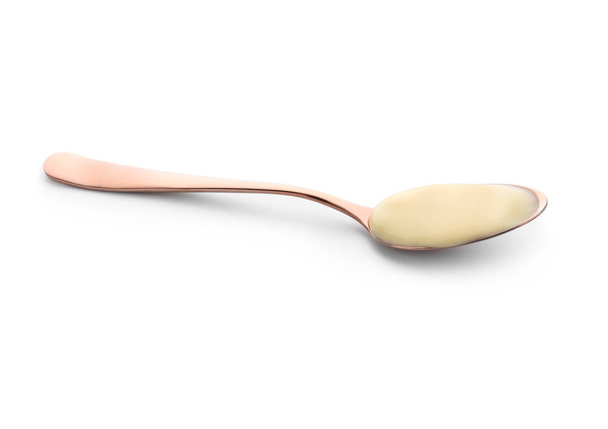 Spoon with tasty yogurt on white background - Photo, Image