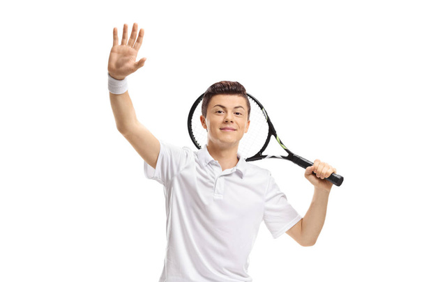 10 代の男性のテニス プレーヤーの分離の白い背景を振って - 写真・画像