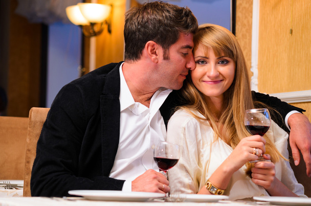 couple is sitting at restaurant - Foto, imagen