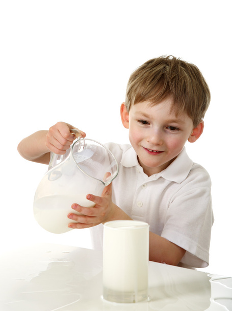 Kid spilt milk - Фото, изображение