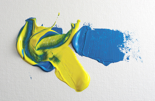 μπλε και κίτρινο ακρυλικά χρώματα σε καμβά - Φωτογραφία, εικόνα