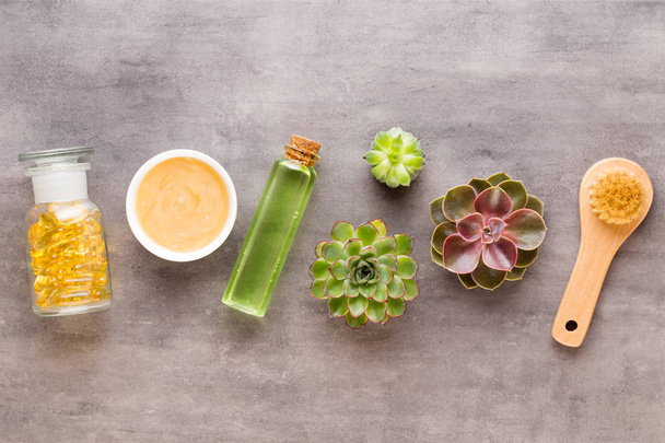 Spa background with hand made bio cosmetic and  cactus compositi - 写真・画像