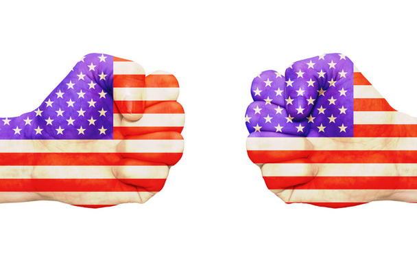Fists that are marked with the image of the US flag. White background, isolate. - Photo, Image