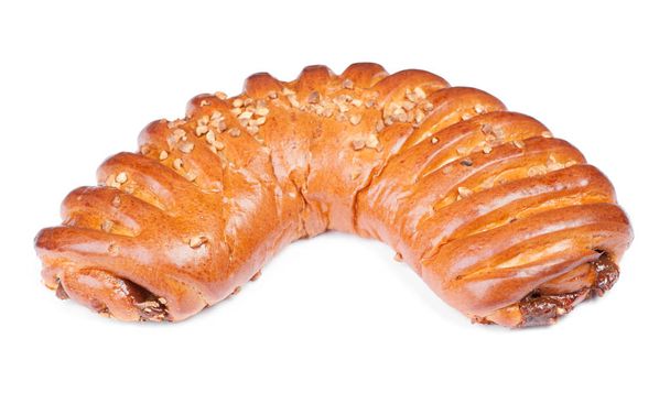 Vers gebakken broodje met gemalen walnoot - Foto, afbeelding