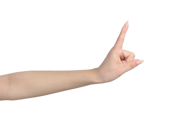 Mano femenina con gesto de manicura
 - Foto, imagen