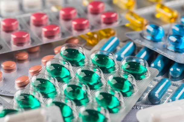 Close up of colorful pills for treatment. - Valokuva, kuva