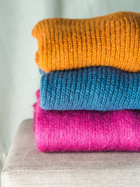 Pile of color woolen sweaters - Photo, Image