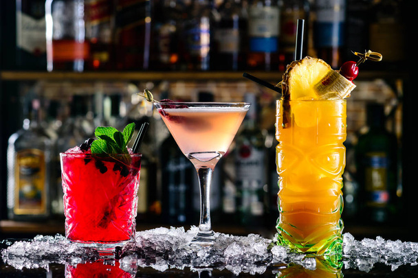 beautiful bright cocktails on the bar in the nightclub - Фото, изображение