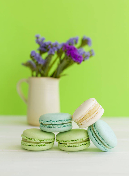 Cake macaron or macaroon from above, colorful almond cookies, pastel colors. - Фото, изображение