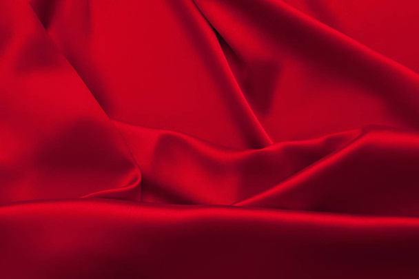 Luxury red satin fabric cloth abstract background - Fotografie, Obrázek