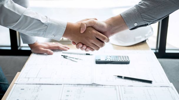 Handshake of collaboration, Construction engineering or architec - Photo, Image