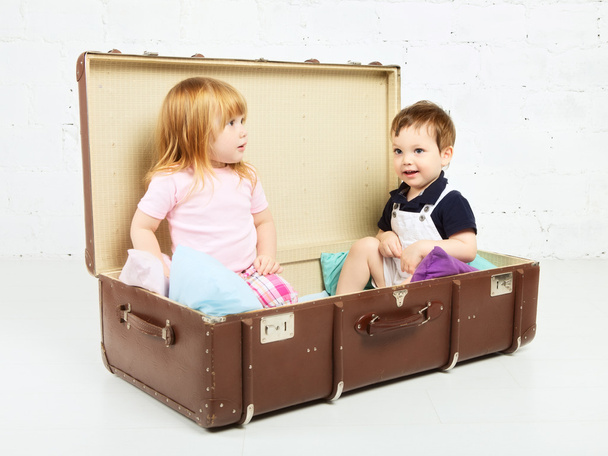Boy and Girl in Suitcase - Fotó, kép