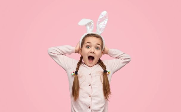 Excited girl in white ears screaming happily - Фото, зображення