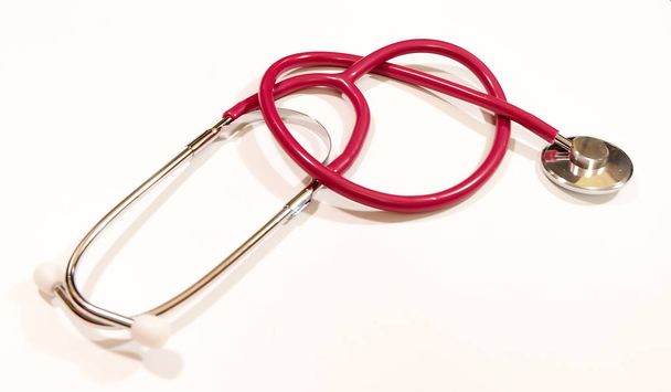 Heart-formed purple stethoscope - Photo, Image