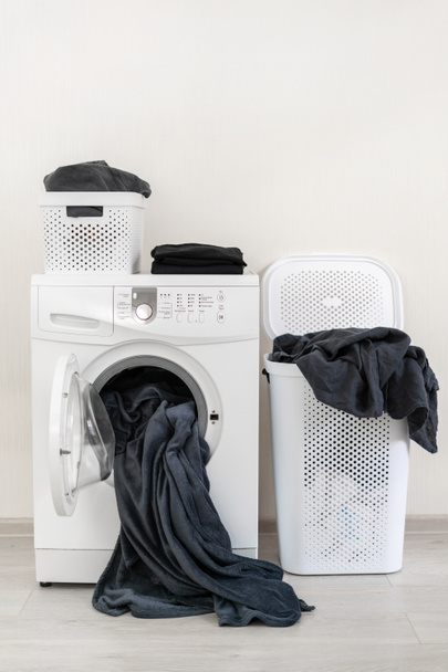 Laundry room interior with washing machine near wall - Photo, Image