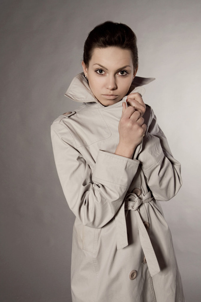 Portrait of beautiful woman in a coat - Fotografie, Obrázek
