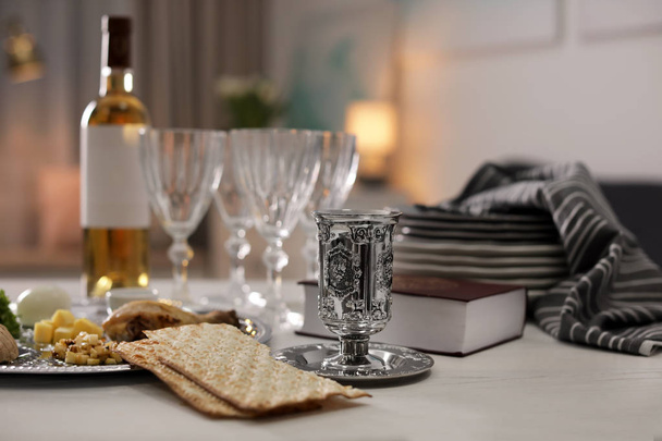 Table served for Passover (Pesach) Seder indoors - Fotoğraf, Görsel