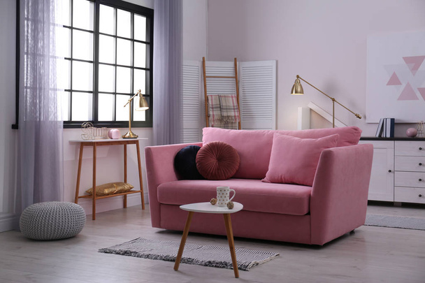Stylish living room interior with comfortable sofa - Foto, immagini